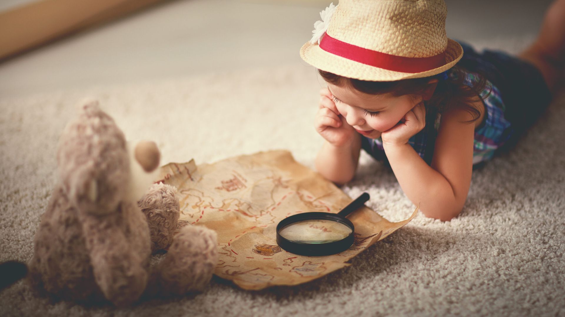 Child looking at map.